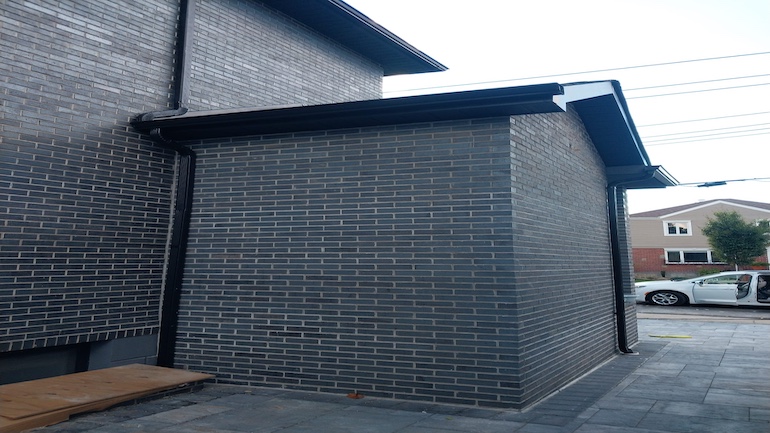 Brown gutter in Queens New York